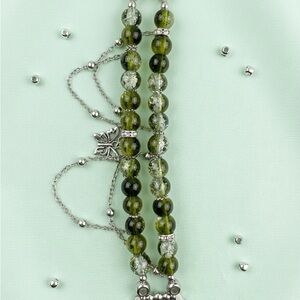 Green and silver Apple Watch band